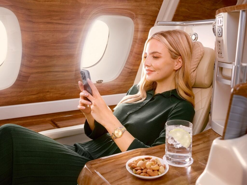 Emirates Business Class lady on phone